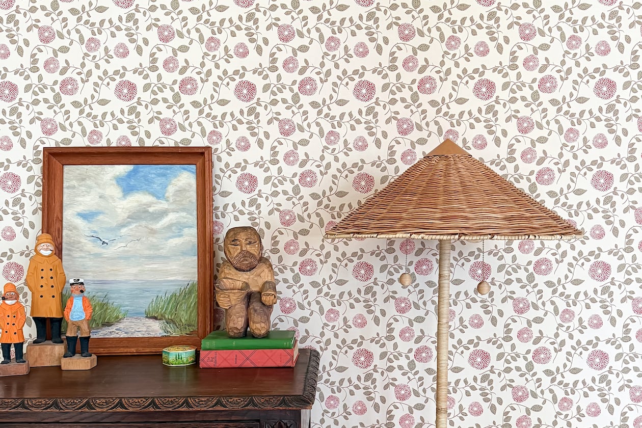 Wallpaper from Gray Benko Home shows how pattern can act as a backdrop, grounding furniture, art and collected pieces without overpowering the space. (Courtesy of Gray Benko Home)