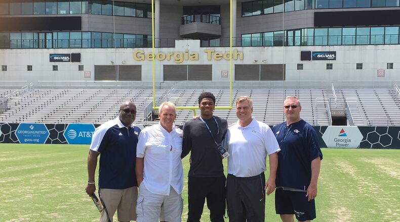 Chico Bennett of Franklin, Tenn., announced his commitment to Georgia Tech June 23, selecting the Yellow Jackets over Tennessee and Virginia. He posed for a picture on an unofficial visit to Tech in May with (from left to right) associate director of player personnel Thomas Balkcom, inside linebackers coach Andy McCollum, defensive coordinator Nate Woody and strength and conditioning coach John Sisk. (Courtesy Chico Bennett)