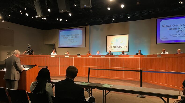 Chief Financial Officer Michael Bell presents the 2019 budget to the DeKalb County Board of Education in 2018. (AJC FILE PHOTO)
