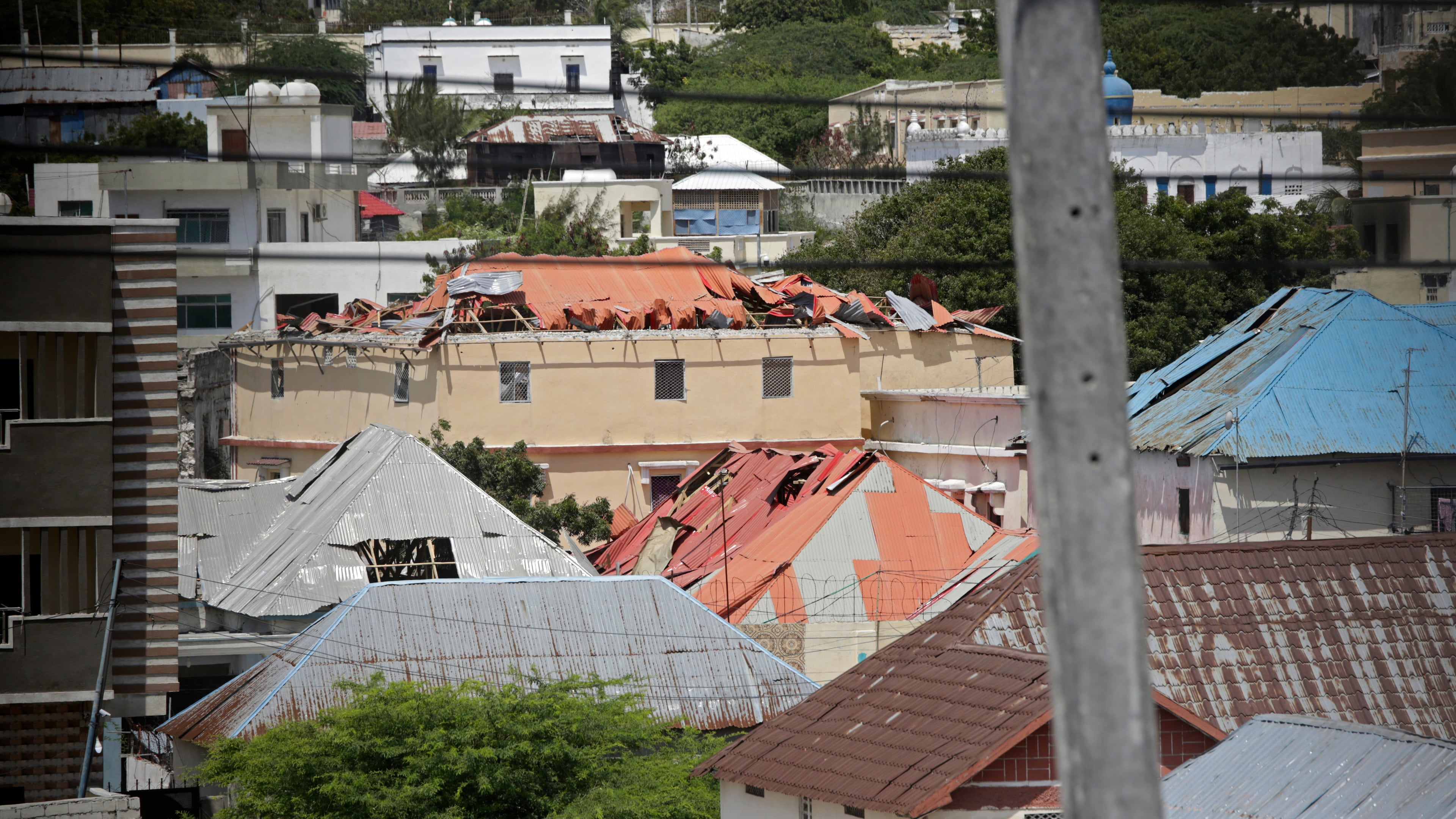 A view of a damaged buildings shows the aftermath of an hours-long militant attack in Mogadishu, Somalia, on Sunday, Oct. 5, 2025. (AP Photo/Farah Abdi Warsameh)