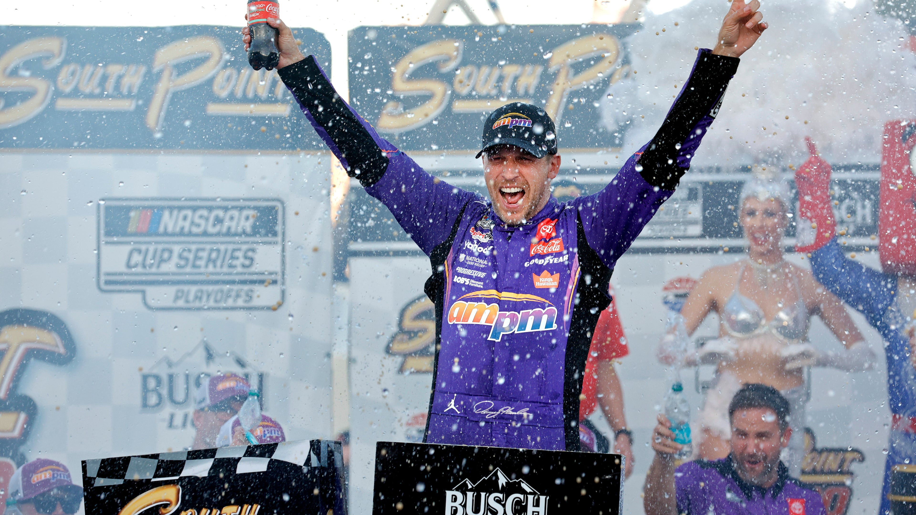 Denny Hamlin celebrates in victory lane after winning a NASCAR Cup Series auto race Sunday, Oct. 12, 2025, in Las Vegas. (AP Photo/Steve Marcus)