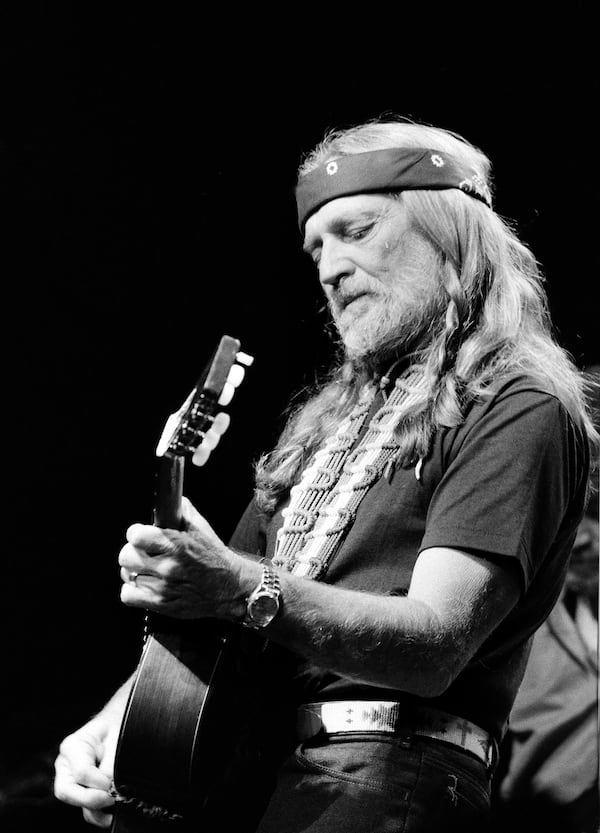 FILE - Willie Nelson performs at New York's Radio City Music Hall Thursday night in the first of six sold-out concerts, May 25, 1984. (AP Photo/Richard Drew, File)