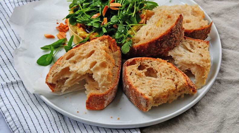 Baked Brie with Savory Jam. (Chris Hunt for The Atlanta Journal-Constitution)