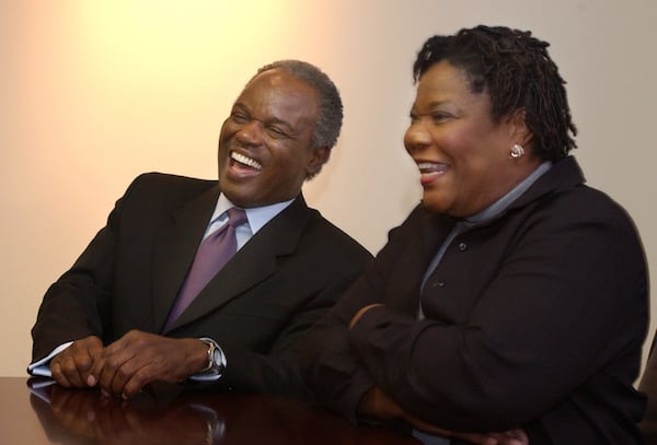 David Scott (left) laughs with his wife Alfredia as she tells of how he courted her with poetry when they were both in college. (Jean Shifri/AJC 2002)