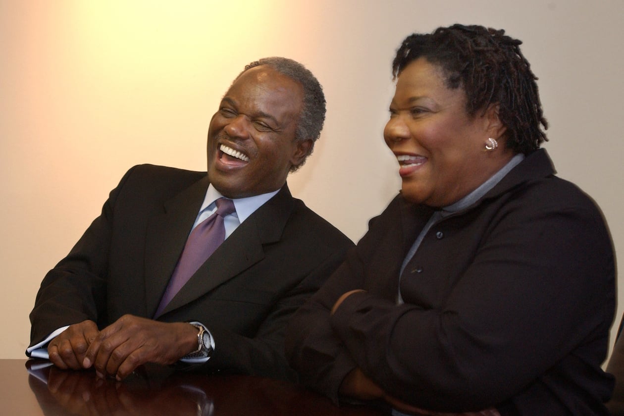 David Scott (left) laughs with his wife Alfredia as she tells of how he courted her with poetry when they were both in college. They married in 1969 and remained together until his death. (Jean Shifrin/AJC 2002)