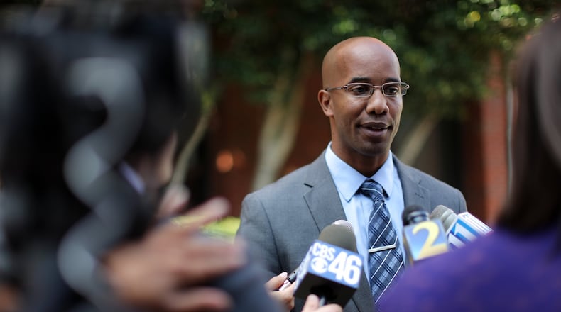 DaKalb County District Attorney Robert James talks about the release of a corruption report on Sept. 30, 2015. Ben Gray / bgray@ajc.com