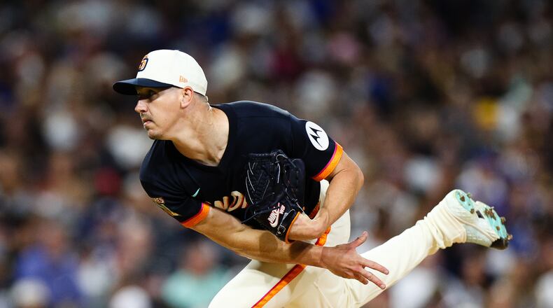 '"San Diego Padres' Walker Buehler follows through on a pitch against the Los Angeles Dodgers in the sixth inning of a baseball game Friday, June 26, 2026, in San Diego. (AP Photo/Derrick Tuskan)