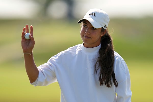 Julia Lopez Ramirez, of Spain, after a par putt on the 18th hole during the third round of the U.S. Women's Open golf tournament at Erin Hills Saturday, May 31, 2025, in Erin, Wis. (AP Photo/Jeff Roberson)