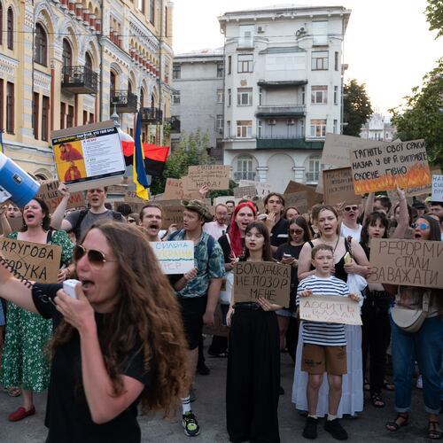People gather to denounce President Volodymyr Zelenskyy's decision to dismiss Defense Minister Mykhailo Fedorov after six months in the post, Thursday, July 16, 2026, Kyiv, Ukraine. (AP Photo/Danylo Antoniuk)