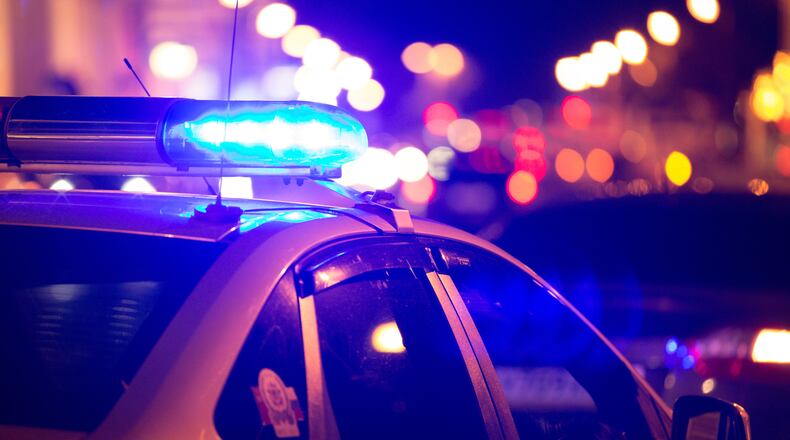 A man armed with a knife and rifle got away with thousands in cash after he robbed a local Spanish grocery store in Sandy Springs.