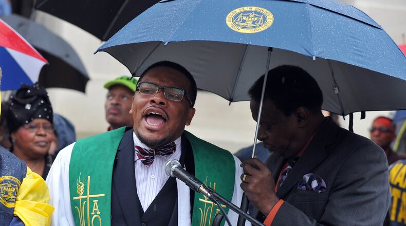 Francys Johnson, the former Georgia president of the NAACP, speaks during the Moral Monday rally at the state Capitol on Jan. 13, 2014.“It’s emotional to step away from doing something you love,” said Johnson.