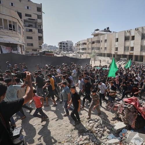 Palestinians carry the body of Ahmad Al-Batsh, a Qassam Brigades commander in Jabaliya, the military wing of Hamas, during his funeral after he was killed in an Israeli airstrike, in Gaza City, Tuesday, Sept. 15, 2026. (AP Photo/Yousef Al Zanoun)