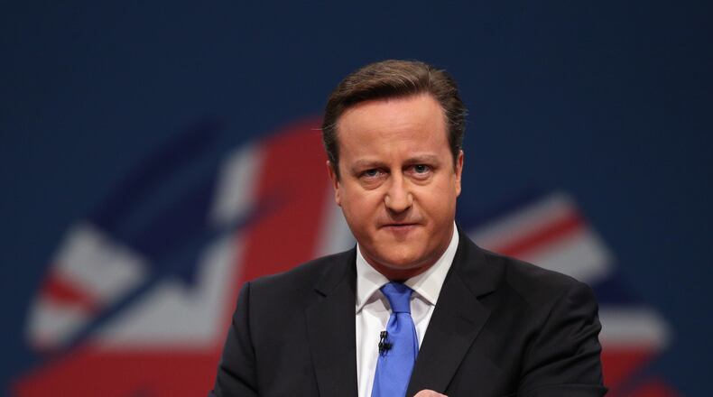 MANCHESTER, ENGLAND - OCTOBER 02: British Prime Minister David Cameron delivers his keynote speech to delegates on the last day of the annual Conservative Party Conference at Manchester Central on October 2, 2013 in Manchester, England. During his closing speech David Cameron said that his "abiding mission" would make the UK into a "land of opportunity". (Photo by Oli Scarff/Getty Images)