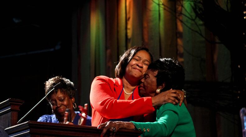 After her election as bishop, Sharma Lewis is congratulated by her sister Le Ontyne Buggs and her mother, Aleathia Lewis. CONTRIBUTED BY NORTH GEORGIA CONFERENCE OF THE UNITED METHODIST CHURCH
