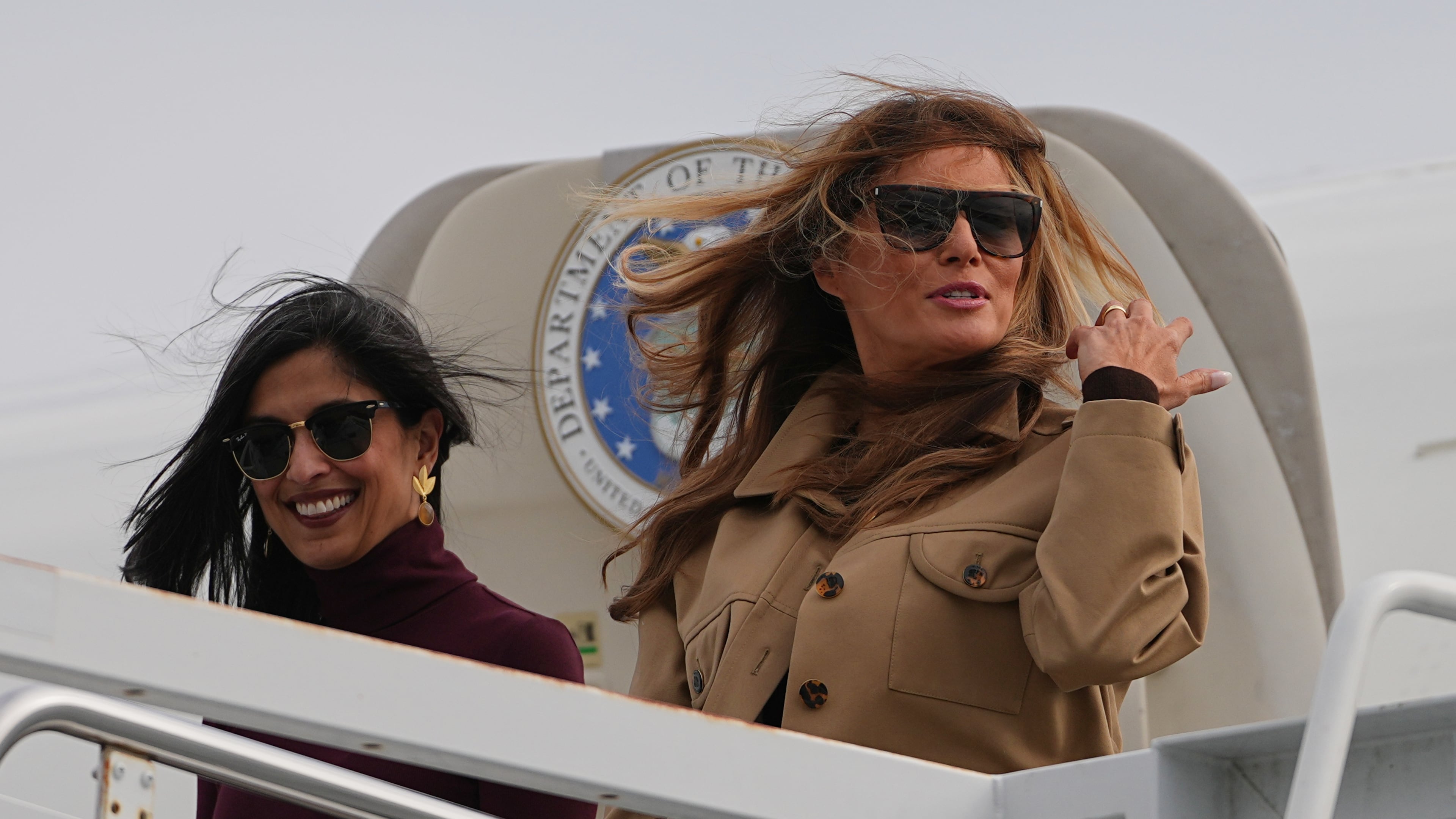 First lady Melania Trump, right, and second lady Usha Vance arrive at Arrive Albert J Ellis Airport in Richlands, N.C., en route to Camp Lejeune, Wednesday, Nov. 19, 2025. (AP Photo/Matt Rourke)