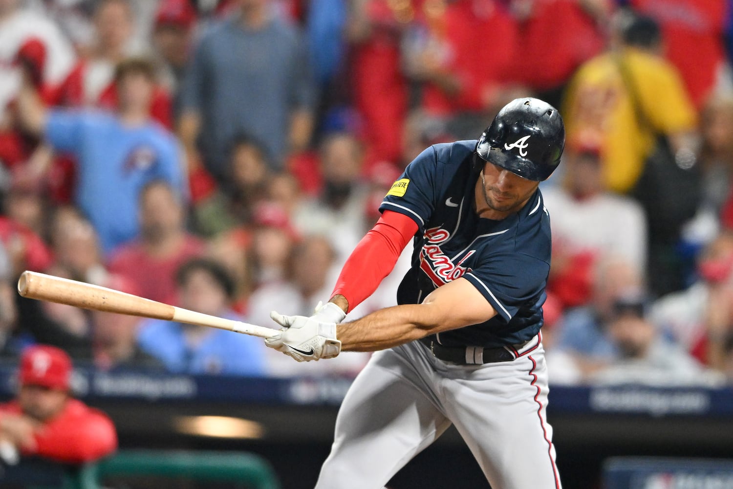 Atlanta Braves’ Matt Olson (28) swings-and-misses for a strikeout against the Philadelphia Phillies during the sixth inning of NLDS Game 3 in Philadelphia on Wednesday, Oct. 11, 2023.   (Hyosub Shin / Hyosub.Shin@ajc.com)