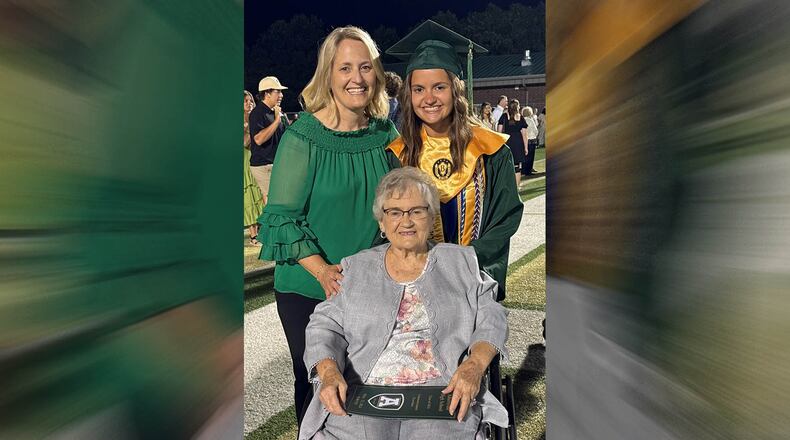 At the Adairsville High School graduation in May, valedictorian Callie Viktora, right, poses for a photo with her mother Sharon Viktora, left, and her grandmother Joan Nelson, center, both of whom also served as valedictorians at Adairsville High. (Courtesy photo)