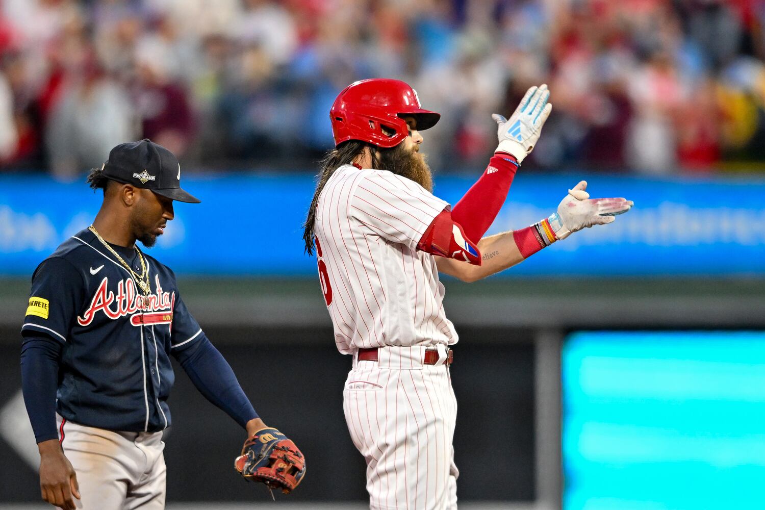 Philadelphia Phillies’ Nick Castellanos fires up his teammates after a double against the Atlanta Braves during the fourth inning of NLDS Game 3 in Philadelphia on Wednesday, Oct. 11, 2023.   (Hyosub Shin / Hyosub.Shin@ajc.com)