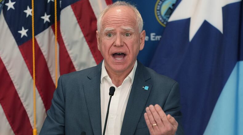 Minnesota Gov. Tim Walz speaks during a news conference in Blaine, Minn., Sunday, Jan. 25, 2026. (AP Photo/Abbie Parr)