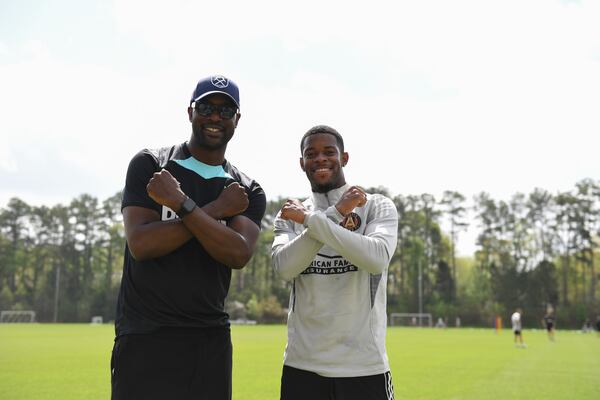 Former West Ham player Carlton Cole visited Atlanta United's training ground on Friday to promote the team's upcoming friendly against Bournemouth. Atlanta United winger Xande Silva (right) is a former West Ham player.
