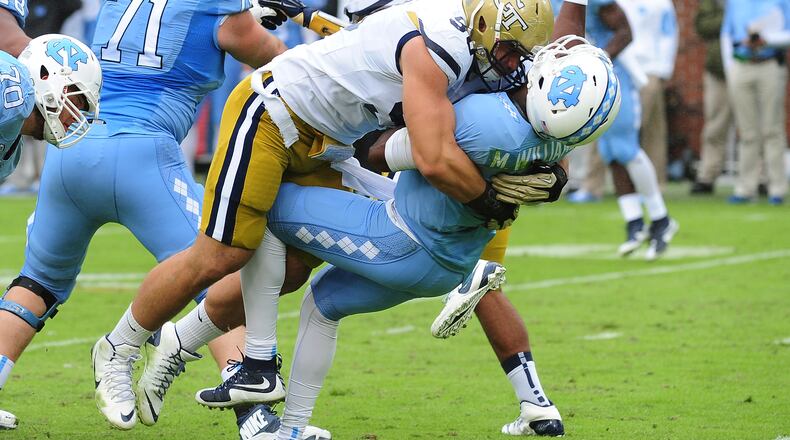 Georgia Tech defensive tackle Adam Gotsis was disqualified for this hit on North Carolina quarterback Marquise Williams in Saturday’s game, a 38-31 defeat for Tech. (Photo by Scott Cunningham/Getty Images)