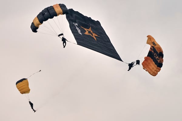 U.S. Army Parachute Team, nicknamed the Golden Knights, participate in the Army's 250th anniversary ceremony, coinciding with President Donald Trump's 79th birthday, Saturday, June 14, 2025, in Washington. (AP Photo/Jacquelyn Martin)