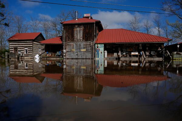 The rising Ohio River floods along Lower River Road, Monday, April 7, 2025, in Rabbit Hash, Ky. (AP Photo/Carolyn Kaster)