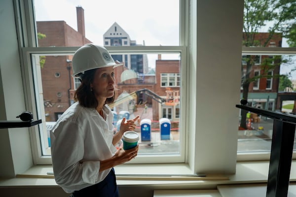 April Stammel, who leads marketing and community engagement with South Downtown, talks with an Atlanta Journal-Constitution reporter during a tour on Wednesday, May 27, 2026. More than 50 historic buildings are being restored to create retail and residential spaces in one of Atlanta’s most ambitious downtown redevelopment projects. (Miguel Martinez/AJC)