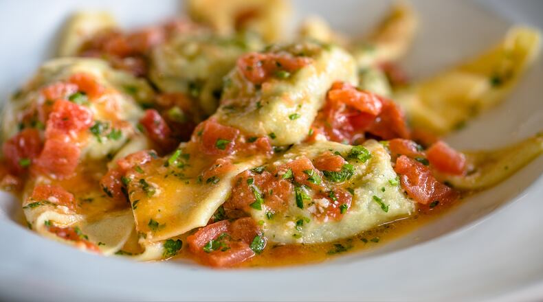 Tortelloni with heirloom tomatoes, butter and marjoram. Photo credit Erik Meadows Photography