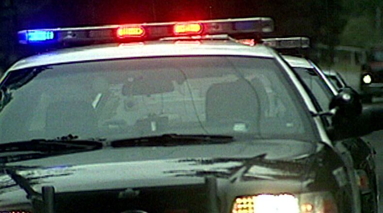 A Gwinnett teen tried to flee police, dragging an officer and leading police on a high-speed chase through Duluth. FILE PHOTO