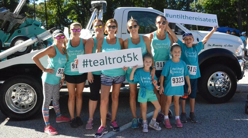 Georgia Ovarian Cancer Alliance Teal Trot 2018 - (L to R) - Julie Moore, Heather Prouty, Dawn Good, Tanya Morea, Emilia Trejos-Welchel, Adriana Welchel, Lucas Comora; (front row)- Clara Trejos, Juliana Welchel. Liliana Welchel (stroller).