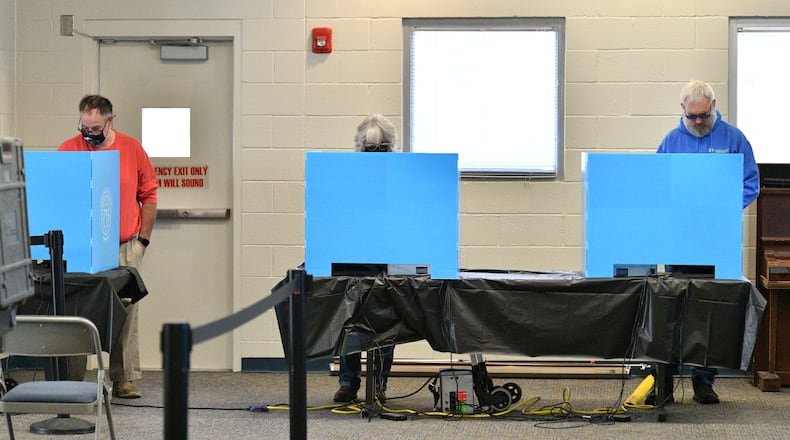 Gwinnett County residents cast their ballots at an early voting location in Mountain Park Activity Building in Stone Mountain on Saturday, October 22, 2022. (Hyosub Shin / Hyosub.Shin@ajc.com)