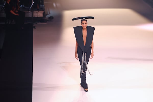 A model wears a creation as part of the Stephane Rolland Fall-Winter 2025/26 Haute Couture collection presented Tuesday, July 8, 2025, in Paris. (AP Photo/Tom Nicholson)