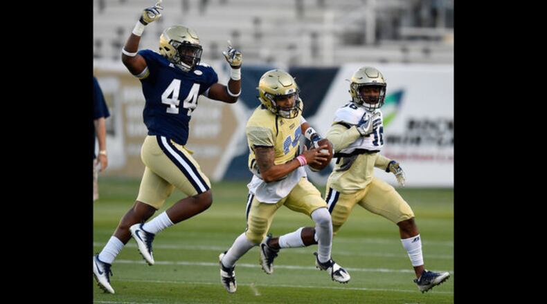 Georgia Tech quarterback Lucas Johnson pitches the ball during the NCAA college football team's spring scrimmage Friday, April 20, 2018, in Atlanta.
