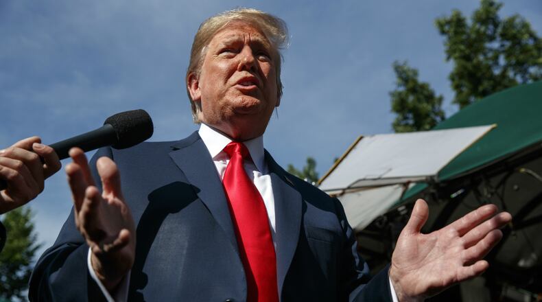 President Donald Trump speaks to reporters at the White House, Friday, June 15, 2018, in Washington.