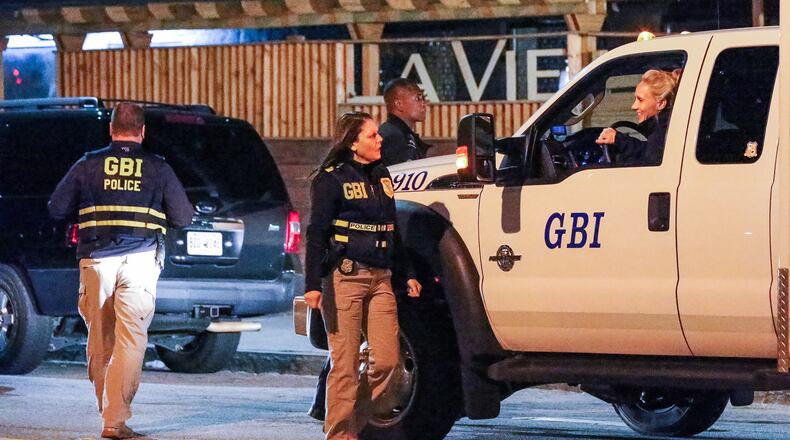 The Georgia Bureau of Investigation is investigating an officer-involved shooting Thursday at La Vie Hookah Bar Bistro on Luckie Street. JOHN SPINK / JSPINK@AJC.COM