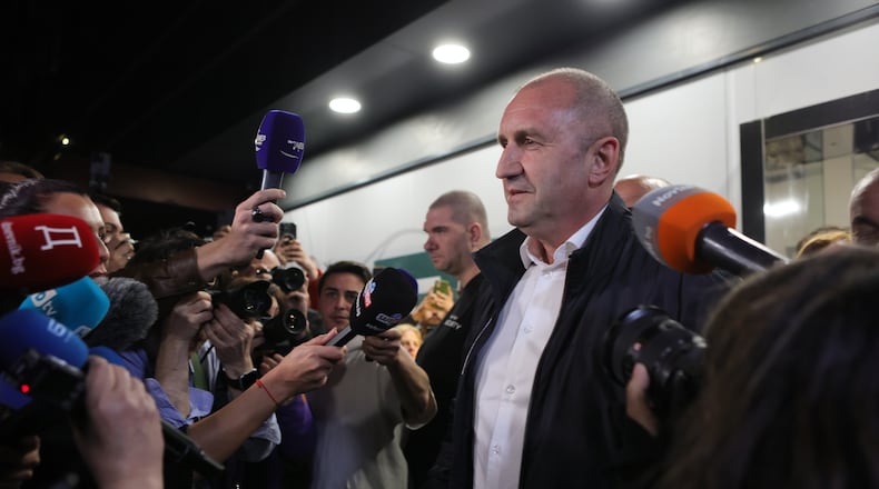 Former Bulgarian President Rumen Radev speaks to journalists after the polls closed in Sunday's election, in Sofia, Bulgaria, April 19, 2026. (AP Photo/Valentina Petrova)