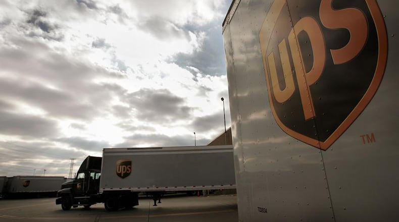 A UPS employee was killed Friday afternoon after a company truck hit him, DeKalb County authorities said.