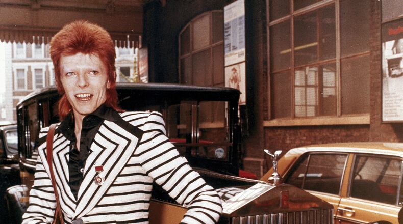 Bowie and his Rolls, circa 1973.
