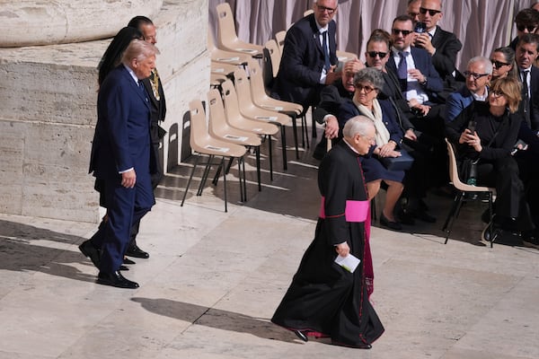 President Donald Trump and first lady Melania Trump, arrive for the funeral of Pope Francis in St. Peter's Square at the Vatican, Saturday, April 26, 2025. (AP Photo/Evan Vucci)