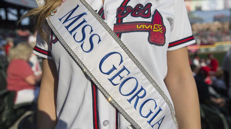 Miss Georgia 2018 Annie Jorgensen wears her sash before the start of a recent Braves game. ALYSSA POINTER / ALYSSA.POINTER@AJC.COM