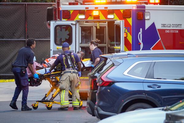 A burglary suspect was taken into custody with apparent gunshot wounds after a confrontation with police and an hourslong search near Dunwoody's Perimeter Mall on Thursday, Aug. 21, 2025. (Ben Hendren for the AJC)