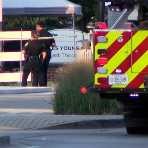 This image taken from video and provided by WTVQ shows officers at the scene of a shooting at Charles Young Park in Lexington, Ky., Saturday, Aug. 15, 2026. (WTVQ via AP)