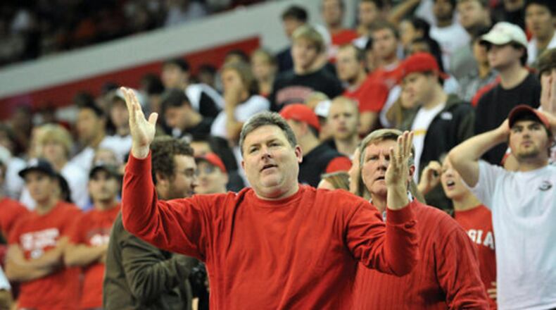 Georgia Bulldogs fans react during the second half against the Colorado Buffaloes at Stegeman Coliseum in Athens on Tuesday, Nov. 16, 2010. Bulldogs won 83 - 74 over the Colorado Buffaloes.