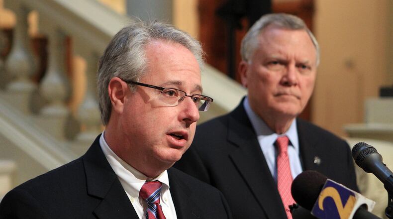 Attorney General Sam Olens and Gov. Nathan Deal. Curtis Compton ccompton@ajc.com