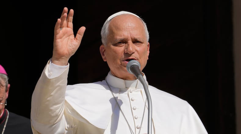 FILE - Pope Leo XIV delivers his blessing as he visits Pavia's Cathedral, northern Italy, on June 20, 2026. (AP Photo/Luca Bruno, File)