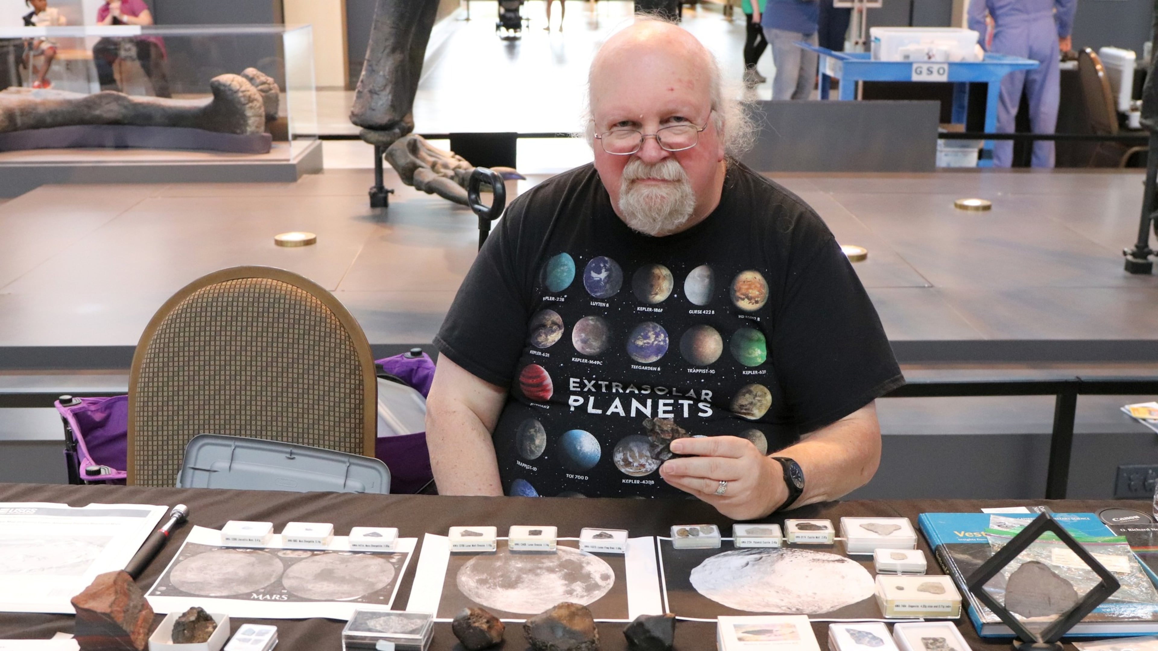 To Richard Jakiel of Lithia Springs, “The coolest thing about meteorites is that they are the oldest things that we can touch.” He displays his meteorite collection at a Tellus Science Museum event. (Courtesy of Richard Jakiel)
