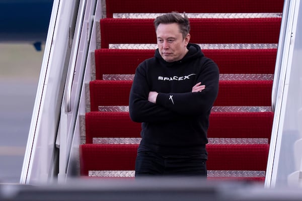 Elon Musk arrives on Air Force One at Philadelphia International Airport, Saturday, March 22, 2025, in Philadelphia. (AP Photo/Chris Szagola)