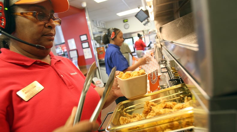 Popeyes workers at a location in Smyrna in 2012. (Photo by Joe Raedle/Getty Images)