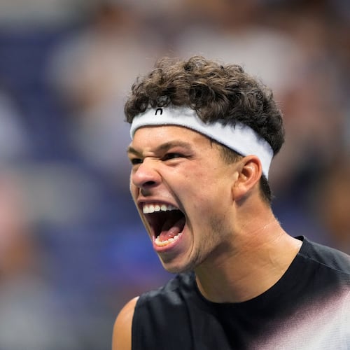Ben Shelton, of the United States, reacts during the men's singles semifinals of the U.S. Open tennis championships against Frances Tiafoe, of the United States, Friday, Sept. 11, 2026, in New York. (AP Photo/Yuki Iwamura)